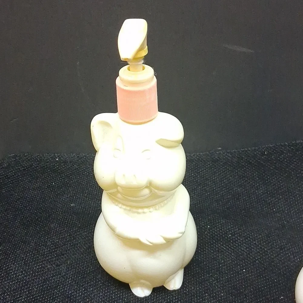 Vintage Avon pig shaped lotion or soap dispensers‎ from 1980's